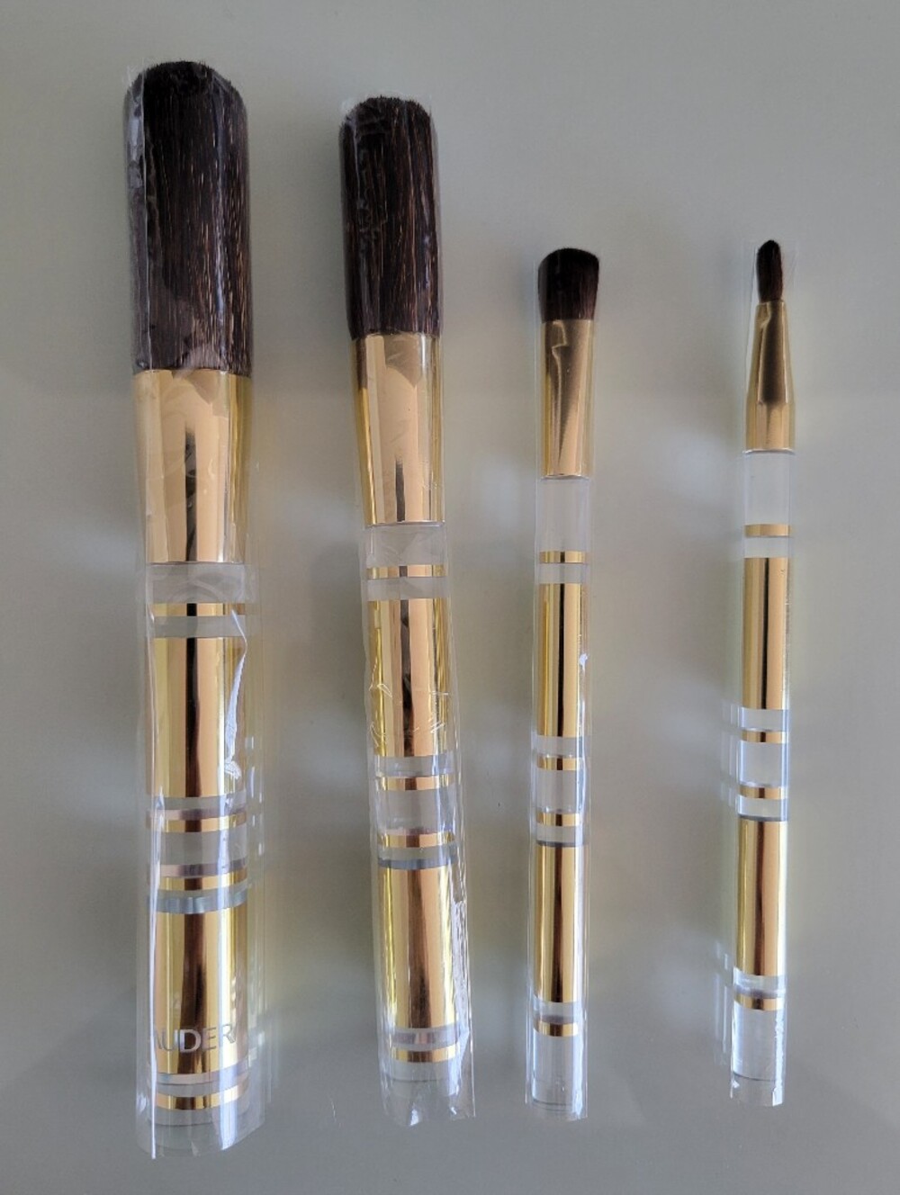 NWOT Estee Lauder Four Piece Makeup Brush Set